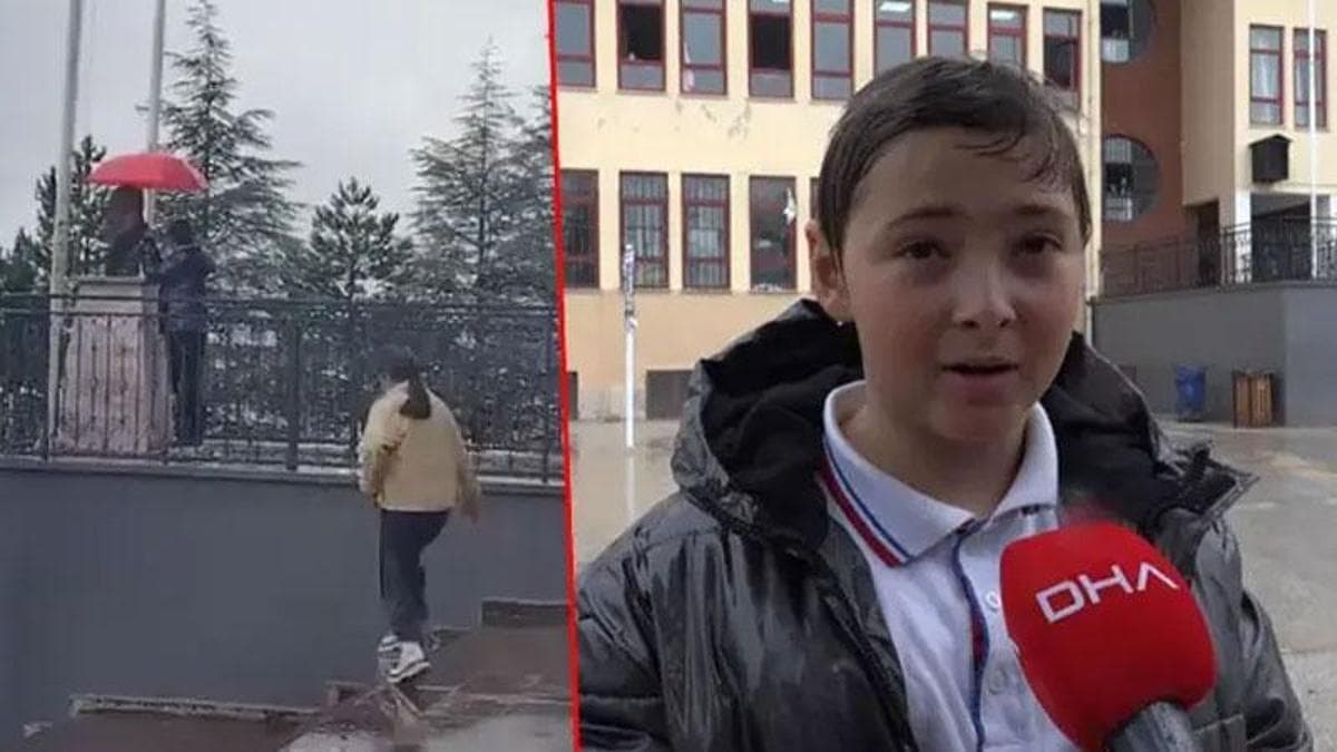 11 yaşındaki Alperen, Atatürk büstüne şemsiye tuttu: Islanmasına içim el vermedi
